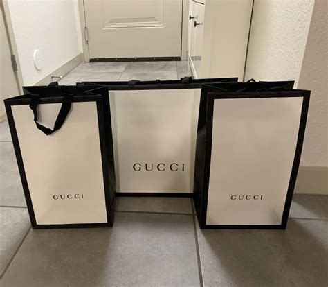 pochette gucci e lv|gucci gift bags for sale.